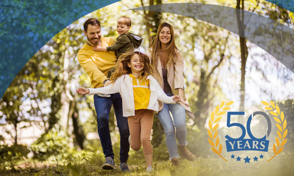 family walking in woods