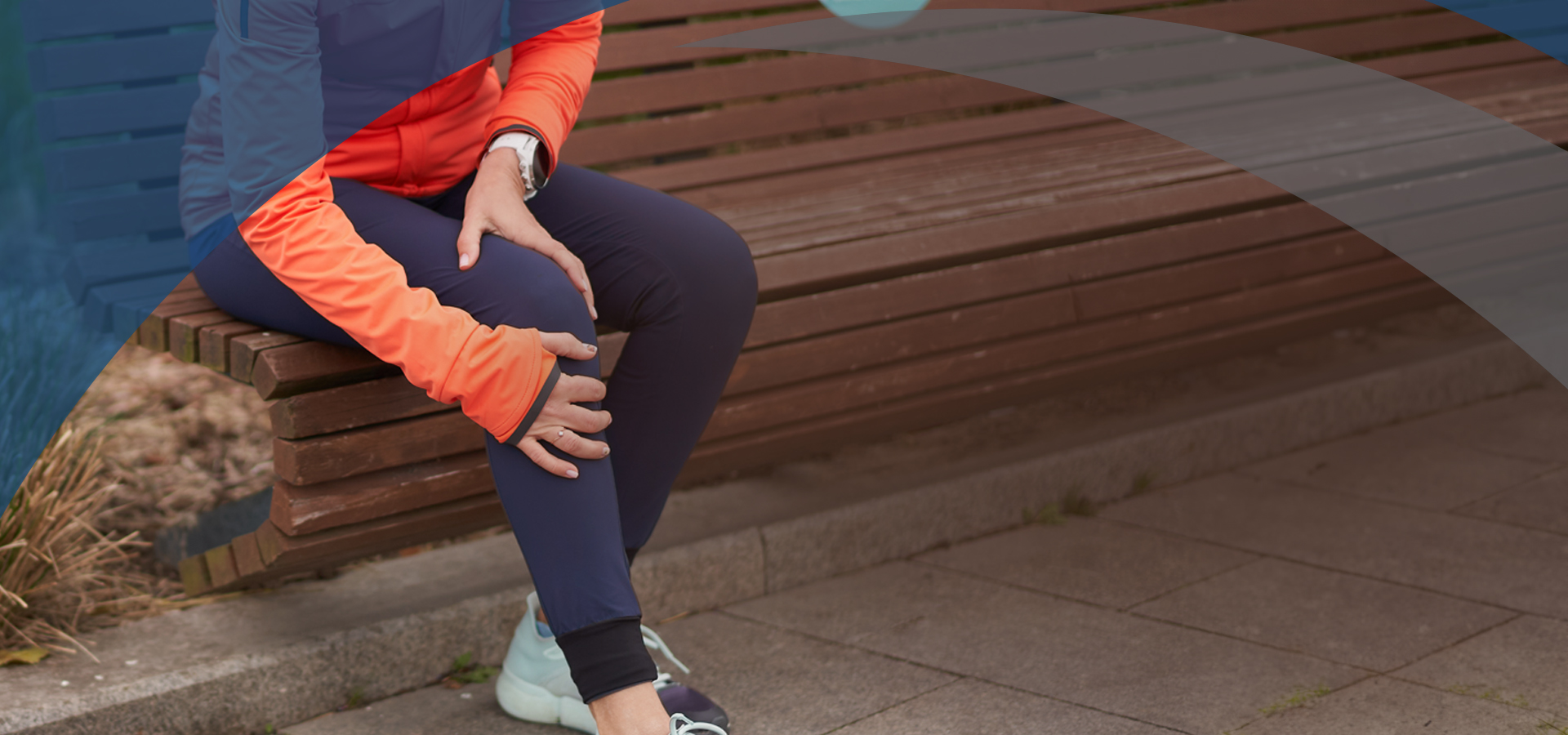 woman holding knee