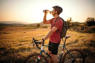 man taking a break from cycling