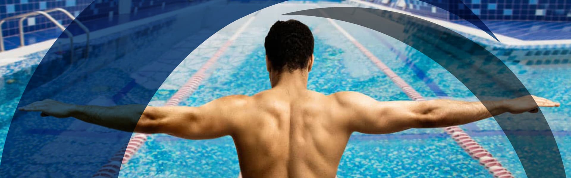 man preparing to swim indoors